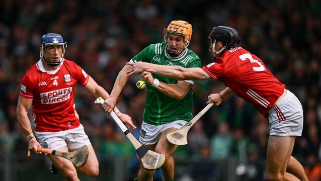 <p>PUMPED UP: Adam English of Limerick is tackled by Eoin Downey and Seán O'Donoghue of Cork at TUS Gaelic Grounds. Picture: Ray McManus/Sportsfile</p>