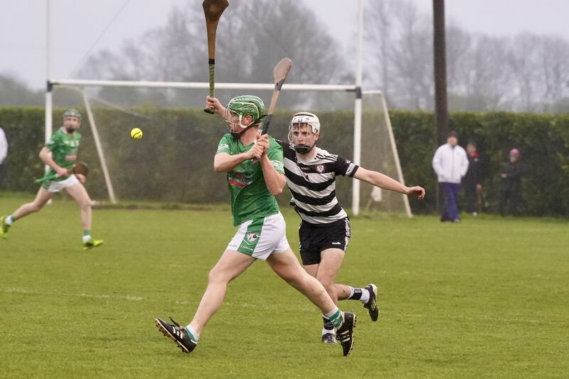 Killeagh’s Andrew Leahy about to shoot as Midleton's Carthaigh Cronin closes in. Picture: Noel Sweeney