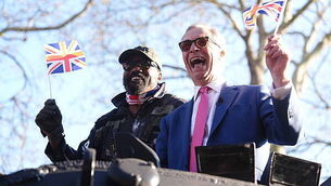Derek Chisora arrives at media event in army tank with Nigel Farage