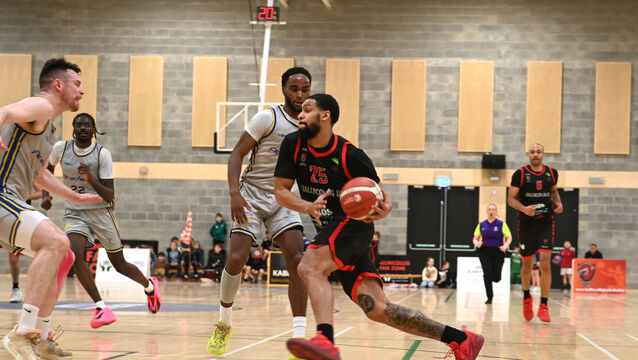 <p> Latavious Mitchell attacks the basket for Ballincollig against KCYMS at MTU Arena. Picture: Larry Cummins</p>