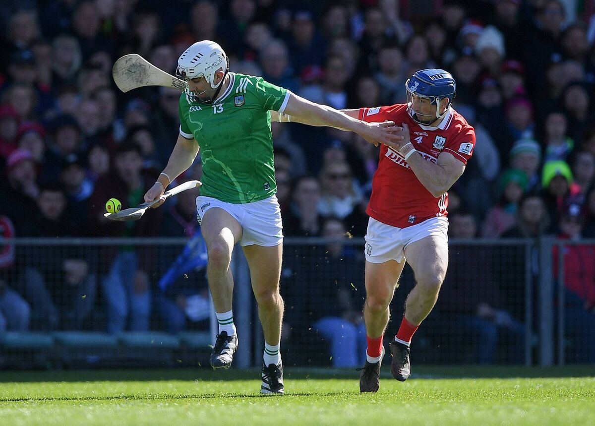 Aaron Gillane of Limerick holds off Seán O'Donoghue of Cork. Picture: John Sheridan/Sportsfile