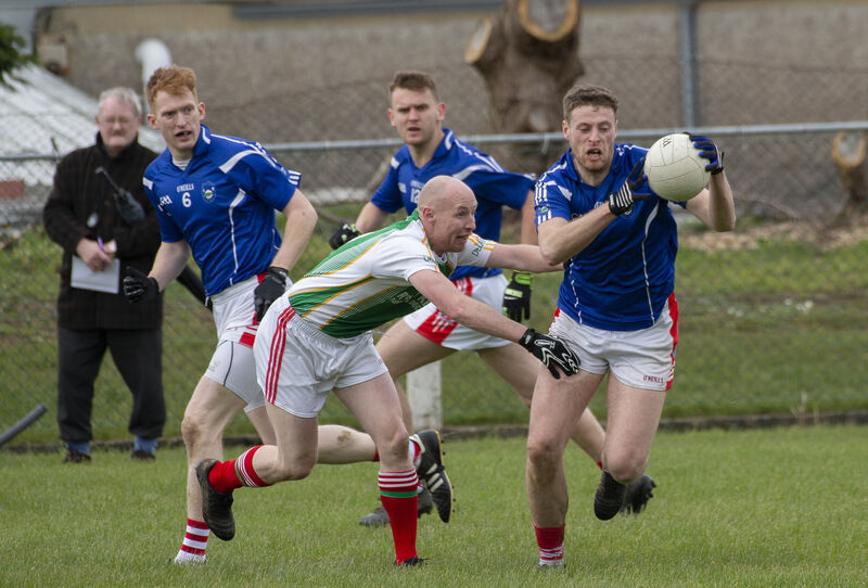 Beara's Brian Terry O’Sullivan makes a break past Darren O’Regan of Seandún in 2021. Picture: Dan Linehan