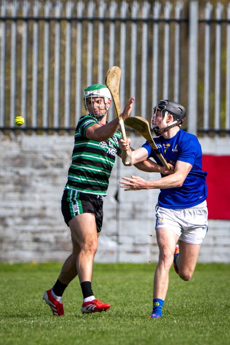 Douglas' Shane Kingston and St Finbarr's James Murray battle for possession. Picture: Chani Anderson