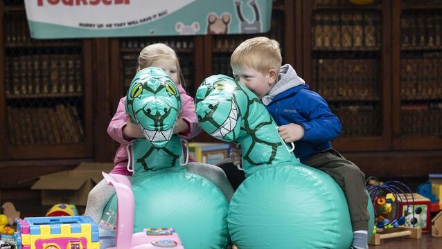 <p>Cork siblings Roisín and AJ Lyons discoverer the blow-up dinosaurs at the swap-and-play event in UCC.	<span class="contextmenu emphasis CaptionCredit">Picture: Clare Keogh</span>
            </p>