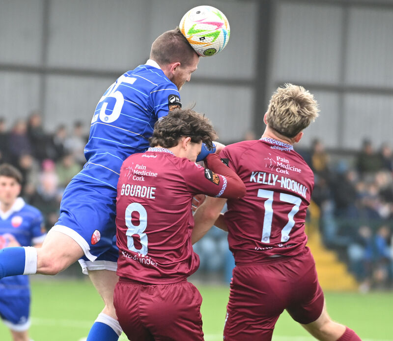 Treaty United's Mark Walsh gets above Cobh Ramblers' Rhys Gourdie and Rhys Kelly-Noonan. Picture: Eddie O'Hare Treaty United's Mark Walsh gets above Cobh Ramblers' Rhys Gourdie and Rhys Kelly-Noonan. Picture: Eddie O'Hare
