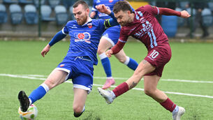 <p>Cobh Ramblers' Dylan McGlade hammers home the first of his goals past Treaty United's Mark Walsh. Picture: Eddie O'Hare</p>