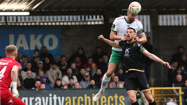 <p>MY BALL: Fiacre Kelleher, Cork City FC, rises high with Kilian Cantwell, Kerry FC, in the SSE Airtricity Men's First Division clash at Munster FA Turner's Cross. Picture: Jim Coughlan.</p>