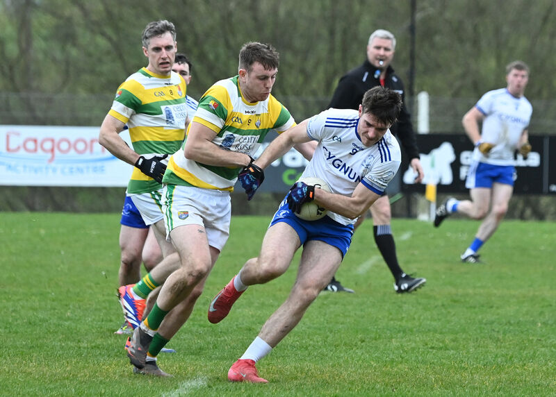 Cill na Martra's Gearóid Ó Goillidhe tries to shake off John O'Brien of Carbery Rangers. Picture: Martin Walsh