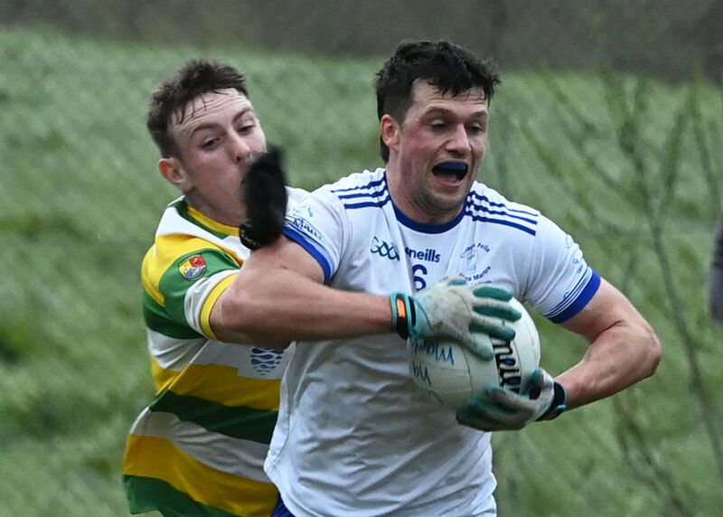 Cill na Martra's Daniel Ó Duinnín determined not to relinquish the ball against John O'Brien of Carbery Rangers. Picture: Martin Walsh