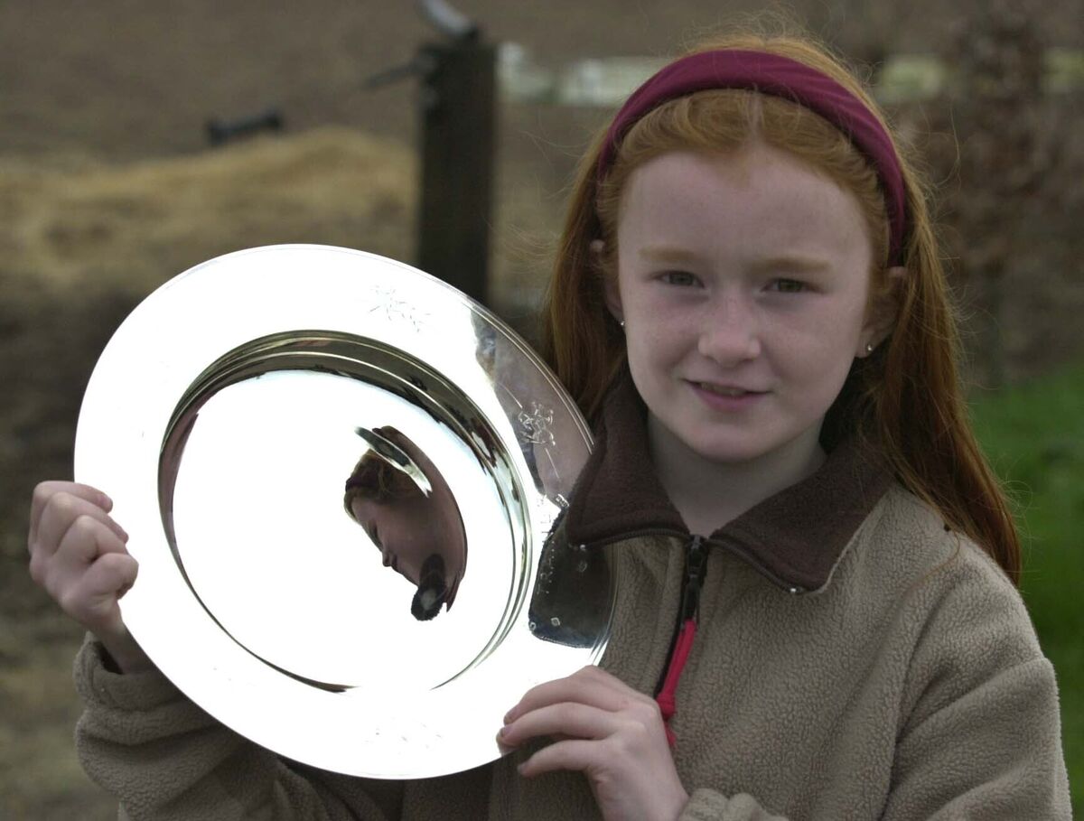 9 year old Jane Mangan, with the trophy for the winning trainer at the Aintree Grand national race. Picture; Eddie O'Hare 9 year old Jane Mangan, with the trophy for the winning trainer at the Aintree Grand national race. Picture; Eddie O'Hare