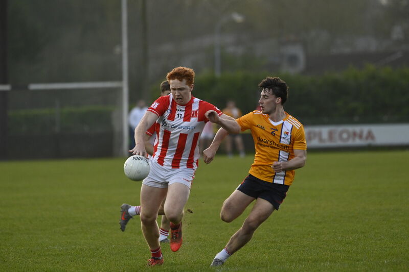 Diarmuid Phelan of Imokilly holds off MTU Cork's Daire Murphy. Picture: Noel Sweeney Diarmuid Phelan of Imokilly holds off MTU Cork's Daire Murphy. Picture: Noel Sweeney