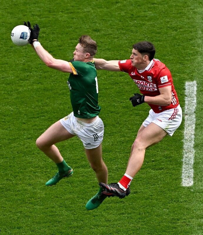 Cian McBride of Meath in action against Colm O'Callaghan of Cork during the Allianz Football League Division 2 final match between Meath and Cork at Croke Park in Dublin. Picture: Ramsey Cardy/Sportsfile Cian McBride of Meath in action against Colm O'Callaghan of Cork during the Allianz Football League Division 2 final match between Meath and Cork at Croke Park in Dublin. Picture: Ramsey Cardy/Sportsfile