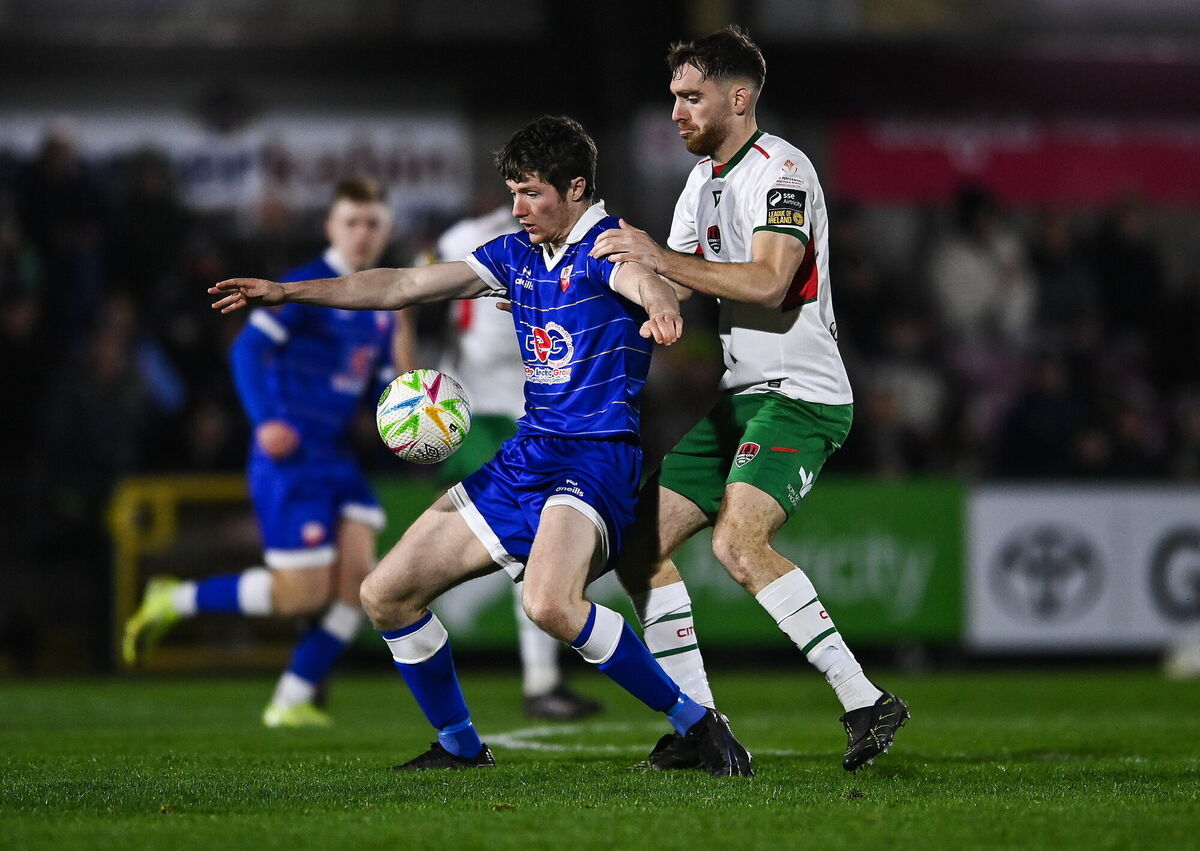 Ben Feeney of Treaty United in action against Conor Drinan of Cork City. Picture: Matt Browne/Sportsfile