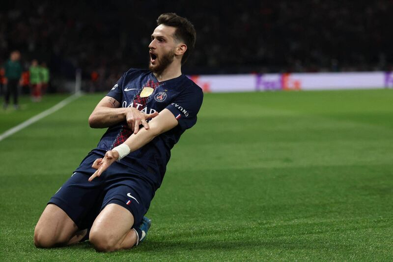 Paris Saint-Germain's Georgian forward Khvicha Kvaratskhelia celebrates scoring his team's second goal during the UEFA Champions League quarter-final first leg against Liverpool FC at the Parc des Princes stadium in Paris. Picture: Anne-Christine POUJOULAT / AFP via Getty Images