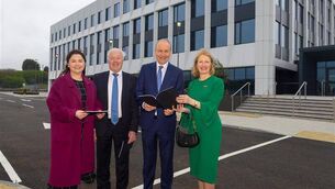<p>Sarah Hickey, senior investment director at the Ireland Strategic Investment Fund; Noel Frisby snr, founder and director of the Frisby Group; Taoiseach Micheál Martin; and SETU president, Prof Veronica Campbell, at the recent launch of Building One, the first commercial building at the Glassworks campus in Waterford. Picture: Patrick Browne</p>