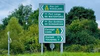 Sign post for Rosslare, Cork, Youghal, Waterford and Dungarvan
