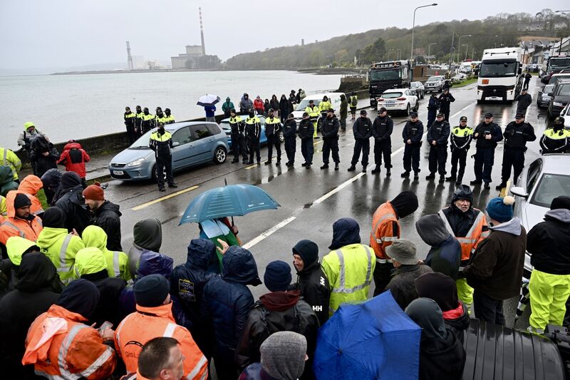  Standoff between gardai and protesters at Whitegate as protesters prevent a fuel tanker from entering the Irving Oil refinery on Friday afternoon. Picture: Larry Cummins