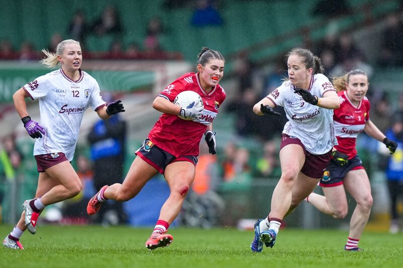 Cork's Aimee Corcoran drives past Ríona Quinn of Galway. Picture: INPHO/James Lawlor