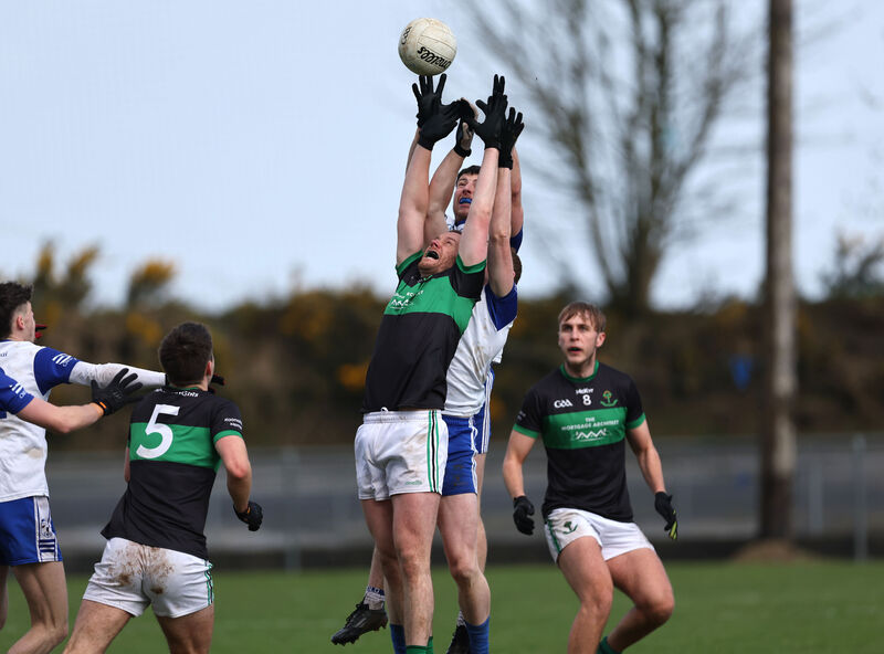 An aerial tussle between Tadc O'Mahony and Timmy O'Connor of Knocknagree and Nemo Rangers' Alan O'Donovan. Picture: Jim Coughlan An aerial tussle between Tadc O'Mahony and Timmy O'Connor of Knocknagree and Nemo Rangers' Alan O'Donovan. Picture: Jim Coughlan
