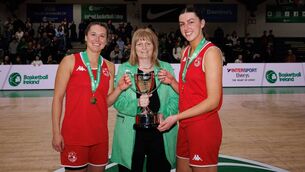 <p>Fr Mathews BC co-captains Mila Pichet and Abby Murphy are presented with the trophy by Basketball Ireland president Margaret Miley.</p> <p>Fr Mathews BC co-captains Mila Pichet and Abby Murphy are presented with the trophy by Basketball Ireland president Margaret Miley.</p>