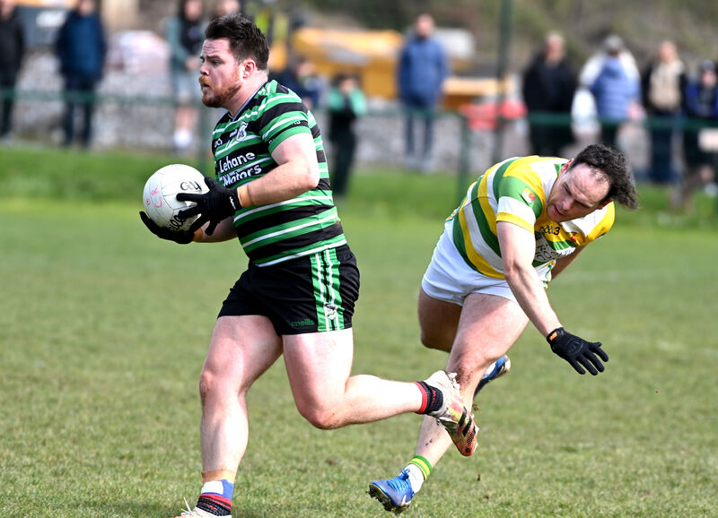 Douglas' Conor Russell wins the ball from Carbery Rangers' Timothy Cullinane. Picture: Eddie O'Hare