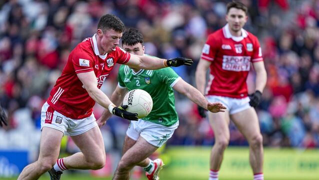 <p>Mark Cronin of Cork kicks a point against Limerick. Picture: INPHO/James Lawlor</p>