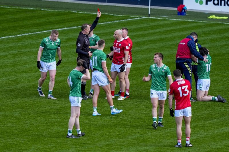 Referee Seamus Mulhare gives Brian O'Driscoll of Cork a red card. Picture: INPHO/James Lawlor