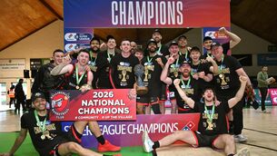 <p>DOUBLE DELIGHT: Ballincollig players celebrate with the Super League trophy in Tallaght. Picture: Paul Phelan/Sportsfile</p>
