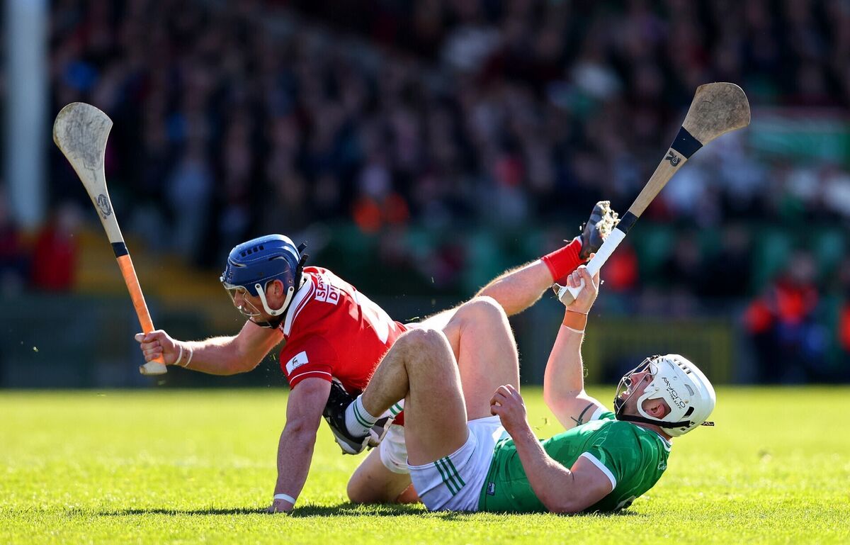 Limerick's Aaron Gillane scores a goal ahead of Seán O'Donoghue of Cork. Picture: INPHO/Tom O’Hanlon
