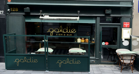 Man accused of smashing windows at three Cork premises