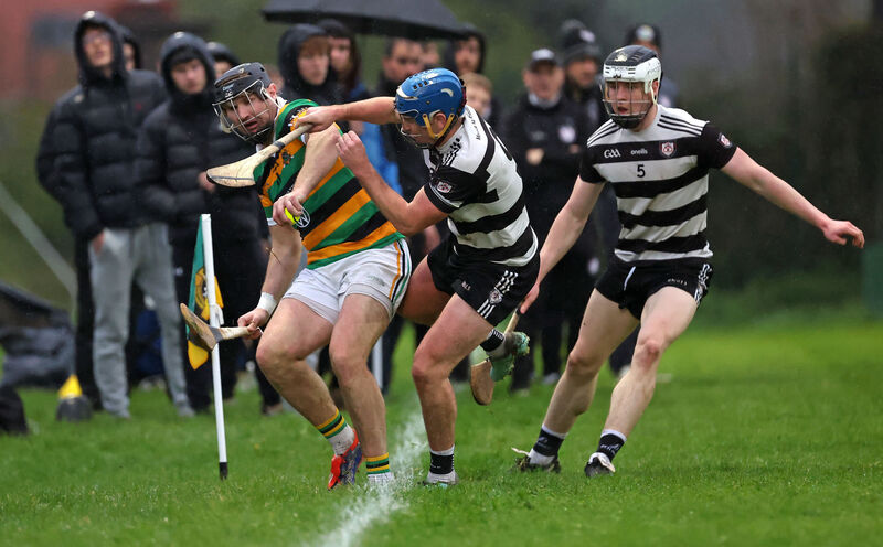 Dean Brosnan of Glen Rovers is forced over the sideline by Midleton's Killian McDermott. Picture: Jim Coughlan Dean Brosnan of Glen Rovers is forced over the sideline by Midleton's Killian McDermott. Picture: Jim Coughlan