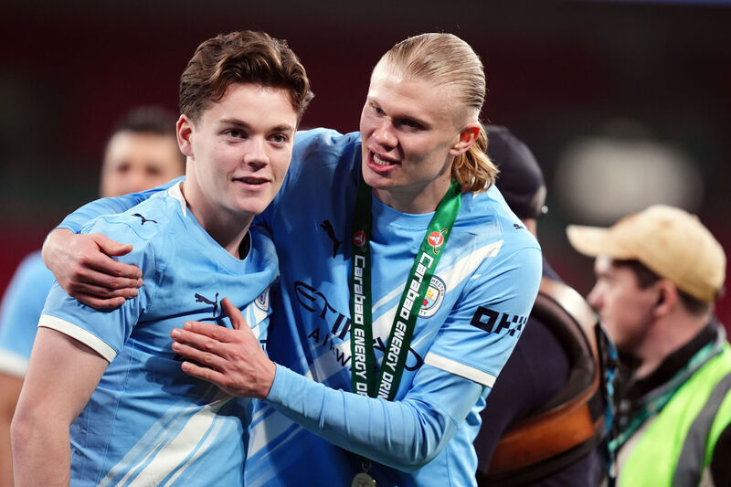 Manchester City's Erling Haaland (right) and Sverre Nypan celebrate  after the Carabao Cup Final win over Arsenal at Wembley Stadium, London. Picture: John Walton/PA Wire