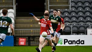 <p> Cork's Seán O’ Leary scores a point against Kerry. Picture: Noel Sweeney</p>