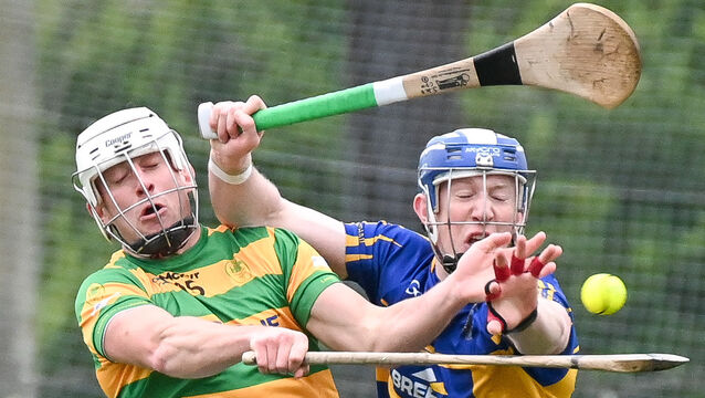 <p> Carrigtwohill's Sean De Burca and Blackrock's Robbie Cotter in a tussle for possession during their RedFM Division 1 Hurling League clash at Carrigtwohill. Picture: David Keane.</p>