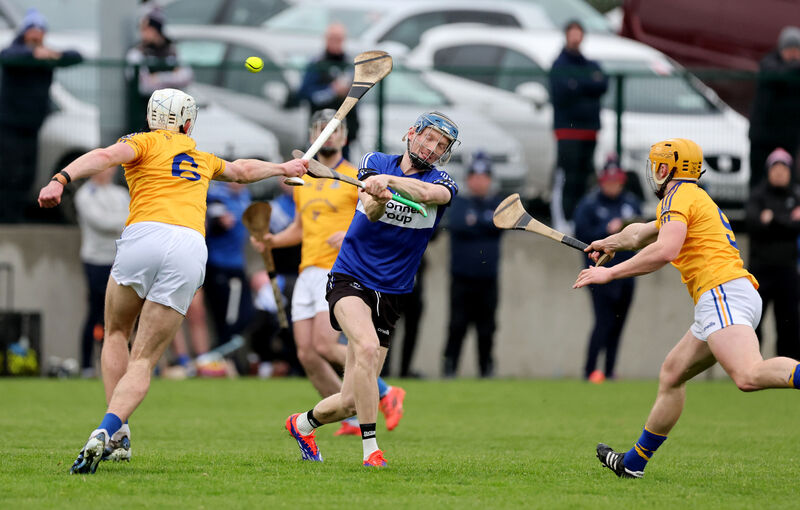  Cian Darcy, Sarsfields, Ciaran Doolan and Billy Hennessy, St. Finbarr's.  2026 Red FM Division 1 Hurling League, Sarsfields V's St. Finbarrs, at Riverstown, Glanmire, Co. Cork.