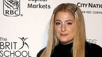 Meghan Trainor apologises to fans as she cancels tour