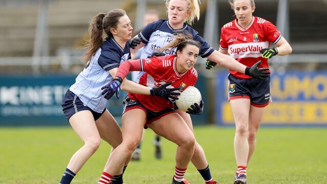 <p>Cork's Shauna Kelly is tackled by Dublin's Michelle Davoren and Carla Rowe during their Lidl Ladies National Football League Division 1 tie at Parnell Park, Dublin. Picture: INPHO/Laszlo Geczo</p>
