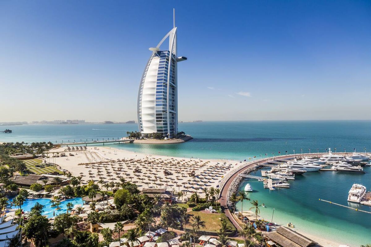 The famous Dubai marina and beach with a view of the Burj Al Arab hotel in Dubai. Photo: iStock