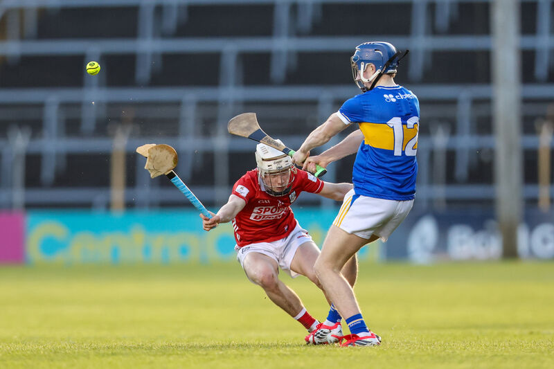 Stephen McHugh of Cork breaks his hurley trying to block down Tipperary's Éanna Tucker. Picture: Diarmuid Brennan/Sportsfocus