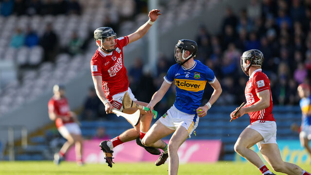 <p>Cork's Sam Ring and Tipperary's James Finn battle for aerial possession in Friday's Electric Ireland Munster MHC game at FBD Semple Stadium in Thurles. Picture: Diarmuid Brennan/Sportsfocus</p>