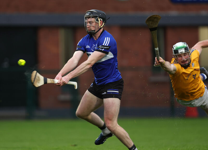  Jack O'Connor, Sarsfields, shoots from Sean Daly, St Finbarr's. Picture: Jim Coughlan.