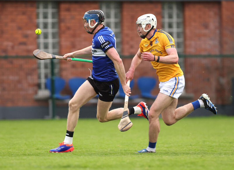  Cian Darcy, Sarsfields, takes on Ciaran Doolan, St Finbarr's. Picture: Jim Coughlan.