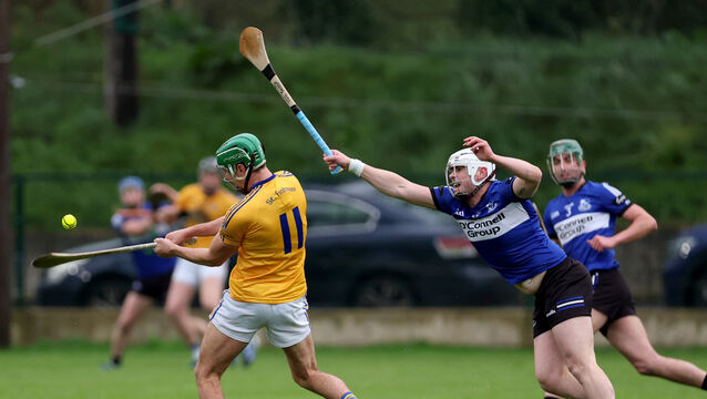 <p> Eoghan Murphy, Sarsfields, tries to block Ben Cunningham, shot for St Finbarr's at Riverstown. Picture: Jim Coughlan.</p>