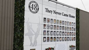 Families of Stardust victims take part in slow walk to Coroner's Court