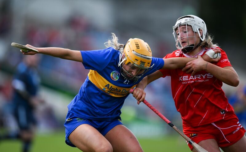 Amy Quinlisk of Tipperary in action against Ava McAuliffe of Cork. Picture: Brendan Moran/Sportsfile