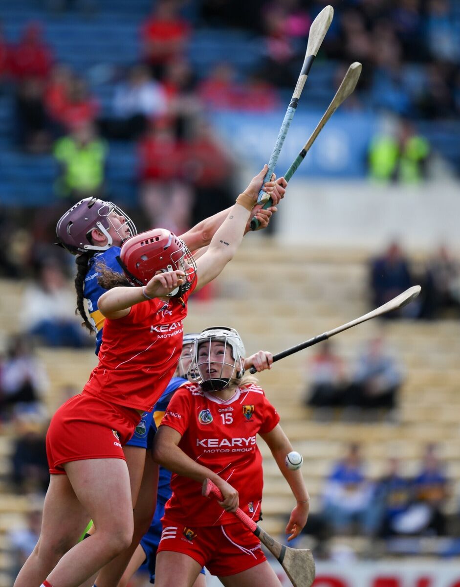 Celine Gordon of Tipperary and Sorcha McCartan of Cork contest a dropping ball. Picture: Brendan Moran/Sportsfile