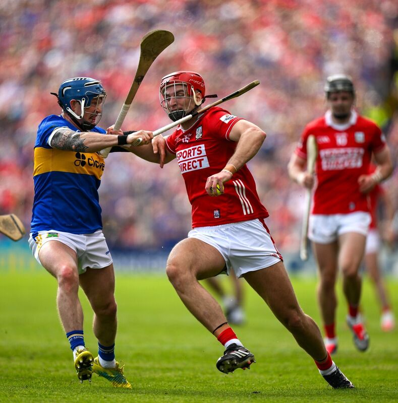Brian Hayes of Cork is tackled by Willie Connors of Tipperary. Picture: Brendan Moran/Sportsfile