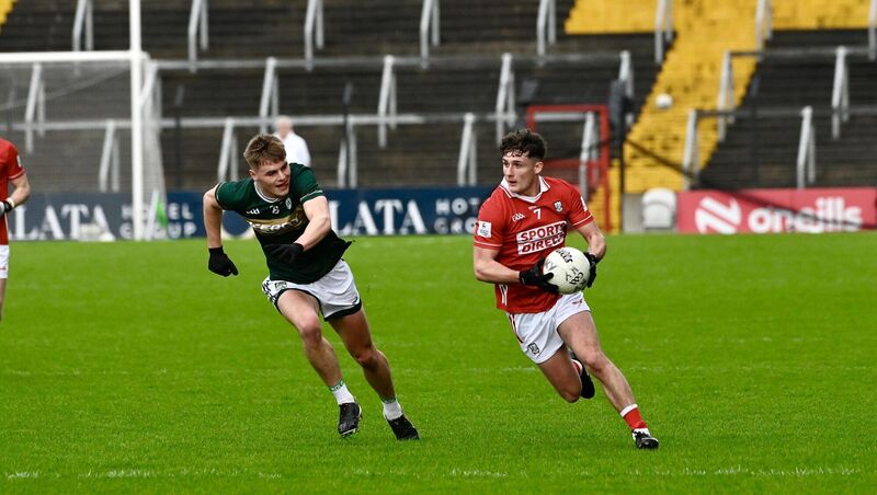 Cork’s Odhran Foley sails past Daniel Kirby of Kerry. Picture: Noel Sweeney