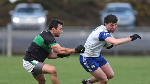 <p> Timmy O'Connor, Knocknagree, gets away from Stephen Cronin, Nemo Rangers during their </p>