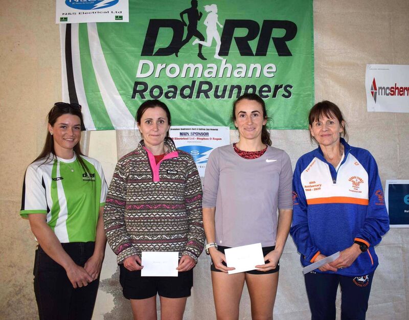 Gemma O'Sullivan, daughter of the late Barry in whose memory the race is held, pictured with the first three in the women's race at Dromahane: Breda McGinn, second; Carol Finn, first; Clotilde Fitzgibbon, third. Picture: John Walshe 